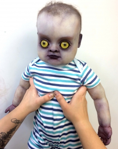 Finished and dressed full body changeling baby prop